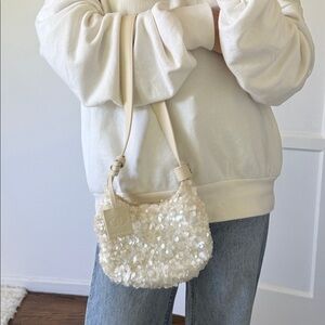 LOST IN ECHO Sequin Crescent Bag in Cream